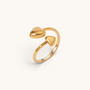 Feetz & Co. Adore adjustable gold stainless steel toe ring featuring two polished heart charms on an open band.