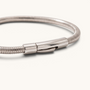 Feetz & Co. Viper anklet in silver-toned polished stainless steel with a ribbed, flexible tube design and secure clasp.