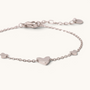 Feetz & Co. Amore silver-tone stainless steel anklet featuring three delicate heart charms on a fine cable chain.