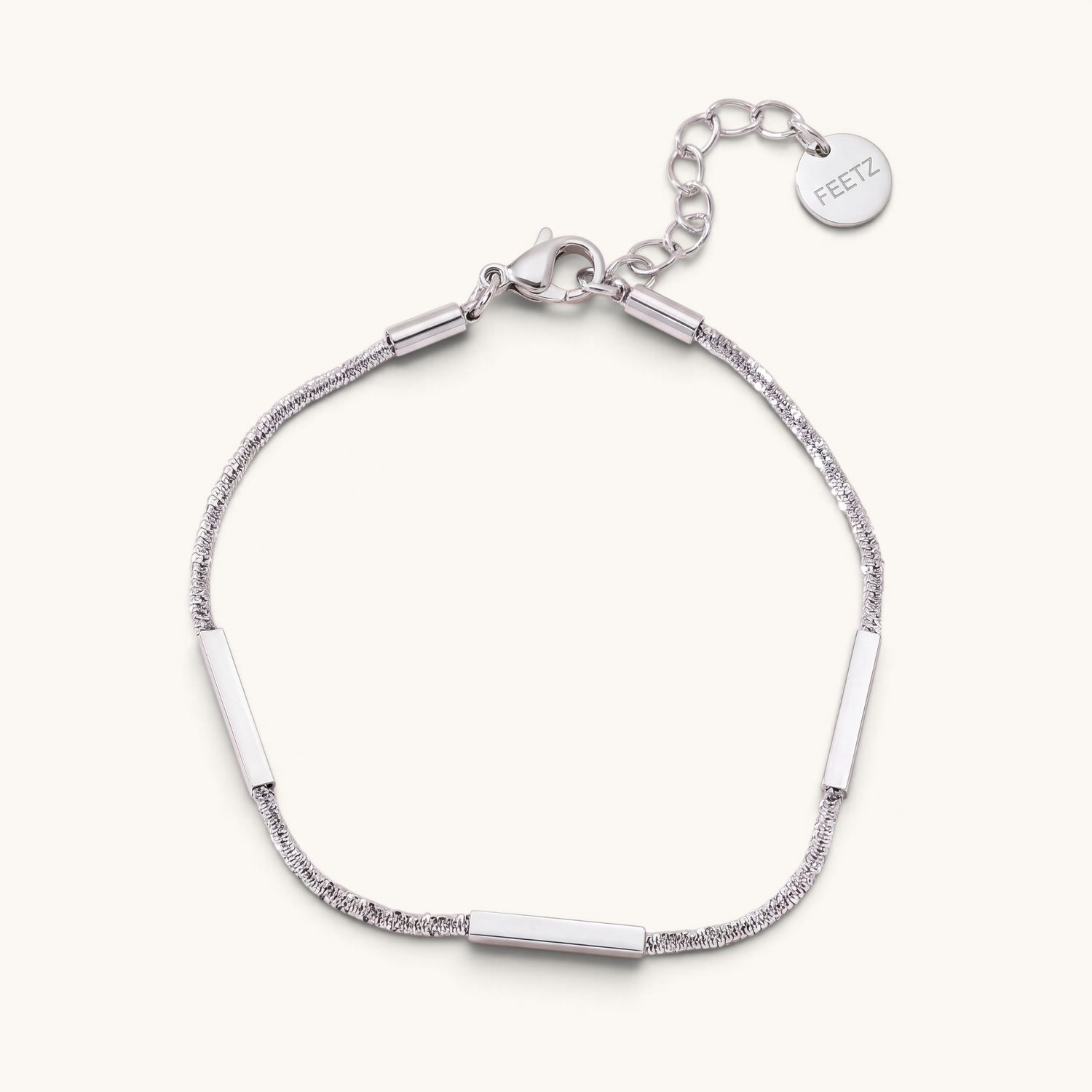 Feetz & Co. Asta anklet in silver-tone stainless steel featuring three polished flat bars on a sparkling chain.