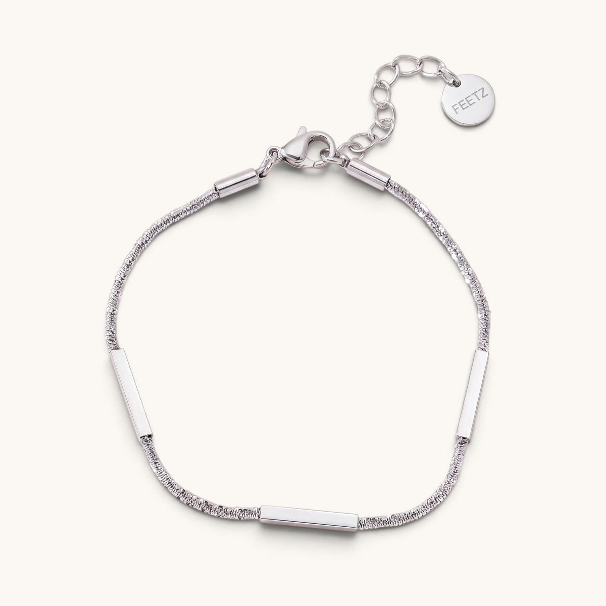 Feetz & Co. Asta anklet in silver-tone stainless steel featuring three polished flat bars on a sparkling chain.