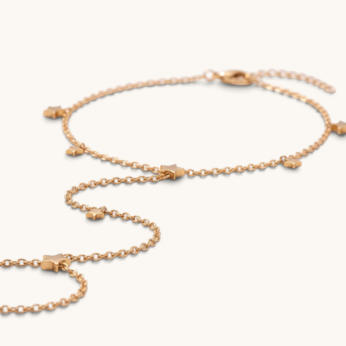 Feetz & Co. Astra gold-plated stainless steel barefoot sandal with delicate star charms on a fine chain