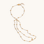 Feetz & Co. gold-plated stainless steel beaded barefoot sandal with multi-strand design and toe loop