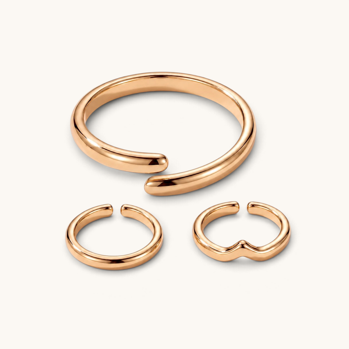 Feetz & Co. gold-plated stainless steel toe ring stack featuring three minimalist adjustable open bands.