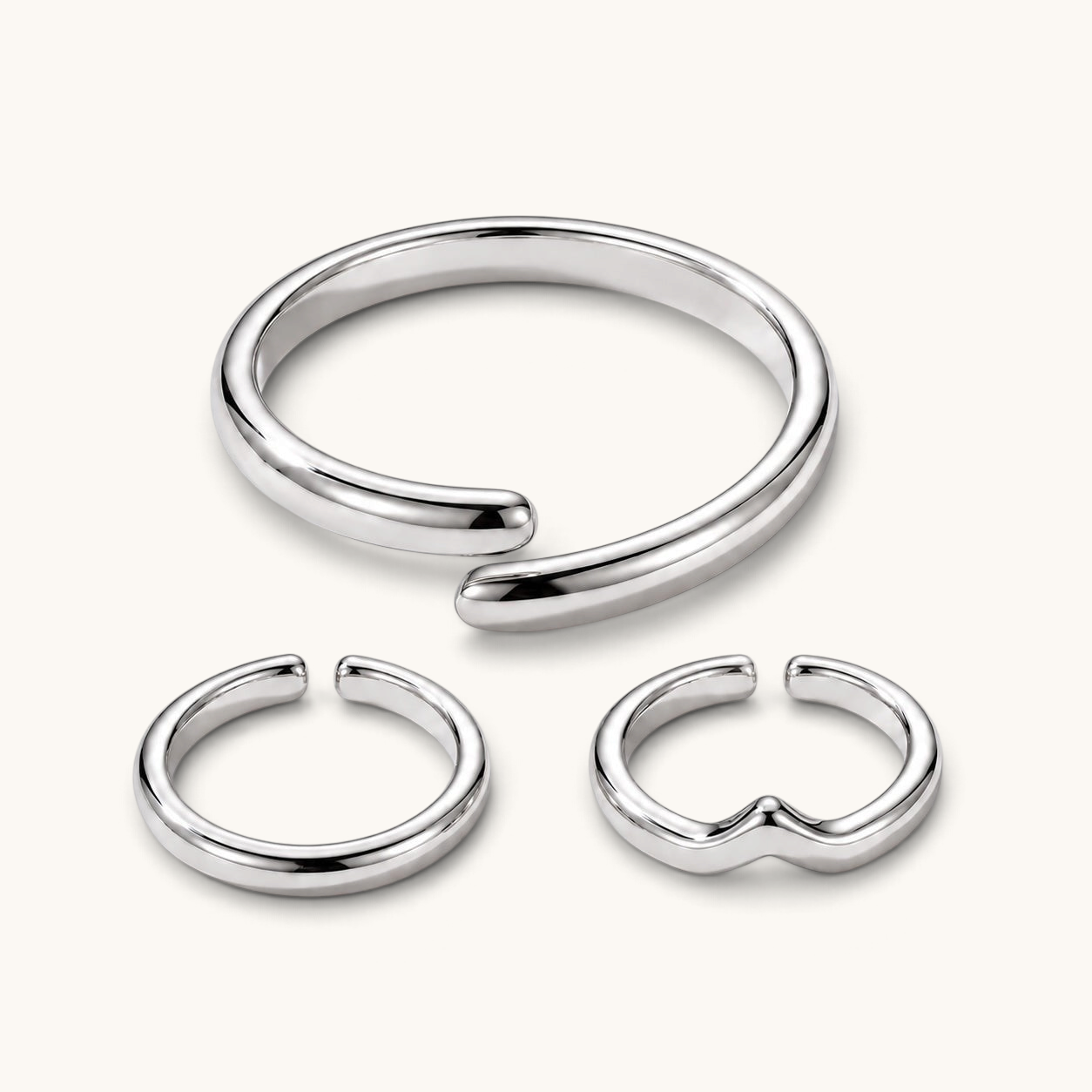 Feetz & Co. silver-plated stainless steel toe ring stack featuring three adjustable open bands in a minimalist style.