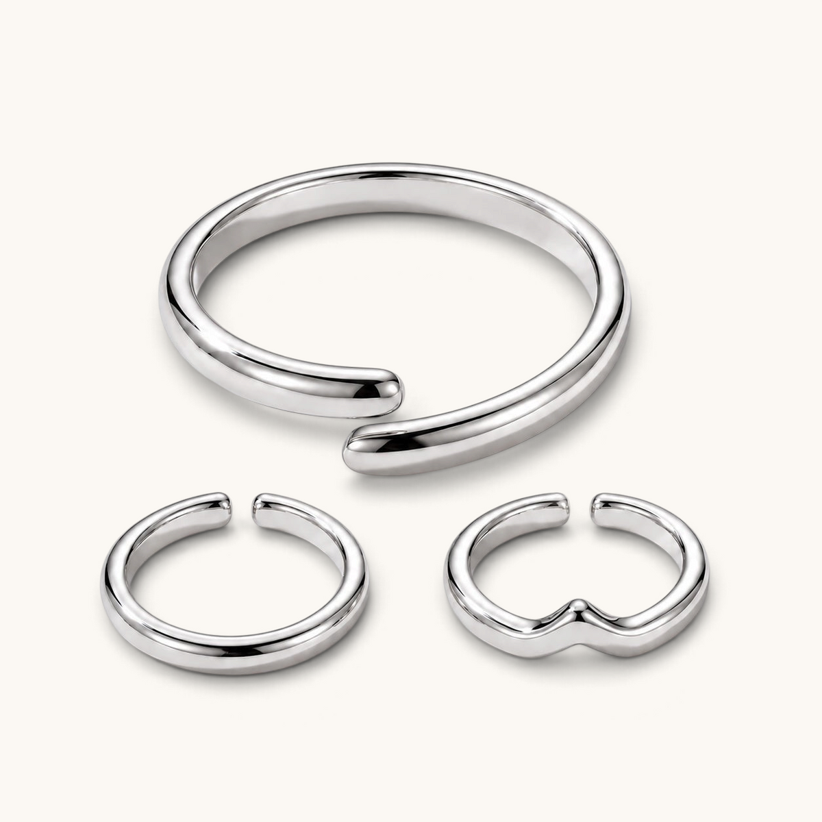Feetz & Co. silver-plated stainless steel toe ring stack featuring three adjustable open bands in a minimalist style.
