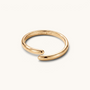 Feetz & Co. CURVA adjustable gold stainless steel big toe ring with a smooth, minimalist curved design.