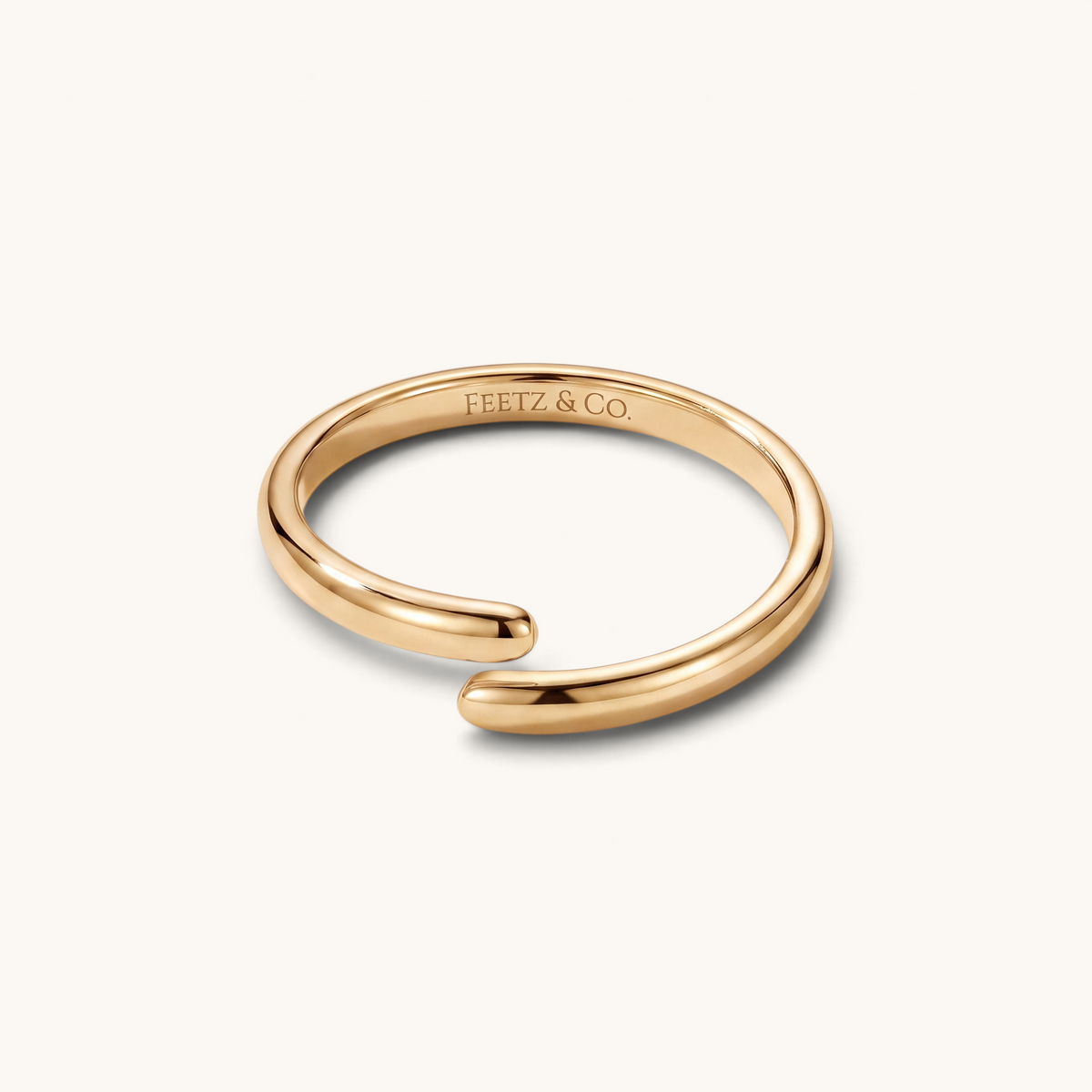 Feetz & Co. CURVA adjustable gold stainless steel big toe ring with a smooth, minimalist curved design.