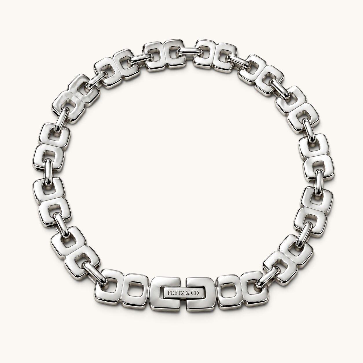 Feetz & Co. Bloc Anklet featuring silver-plated stainless steel squared links in a structured architectural design.
