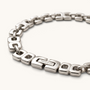 Feetz & Co. Bloc Anklet featuring bold silver-plated stainless steel squared links with a secure branded clasp.
