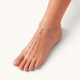 Feetz & Co. Cascade gold-plated stainless steel beaded barefoot sandal with multi-strand design on a woman's foot.
