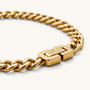 Feetz & Co. Cuba Anklet featuring a polished 18K gold-plated stainless steel flat curb chain with a branded clasp.