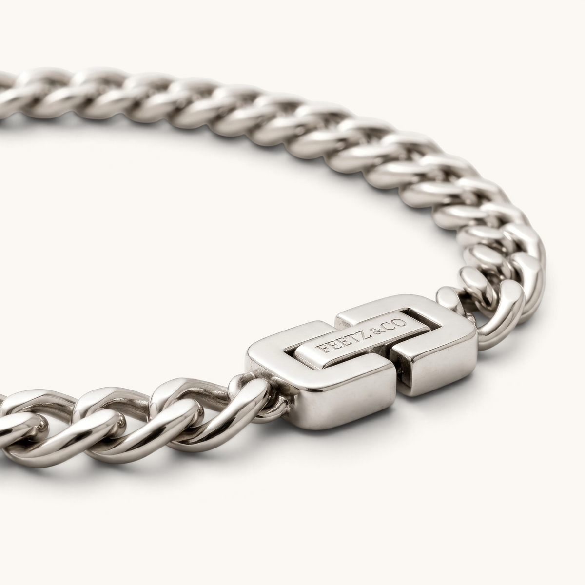 Feetz & Co. silver-plated stainless steel Cuba anklet featuring a sleek flat curb chain and branded clasp
