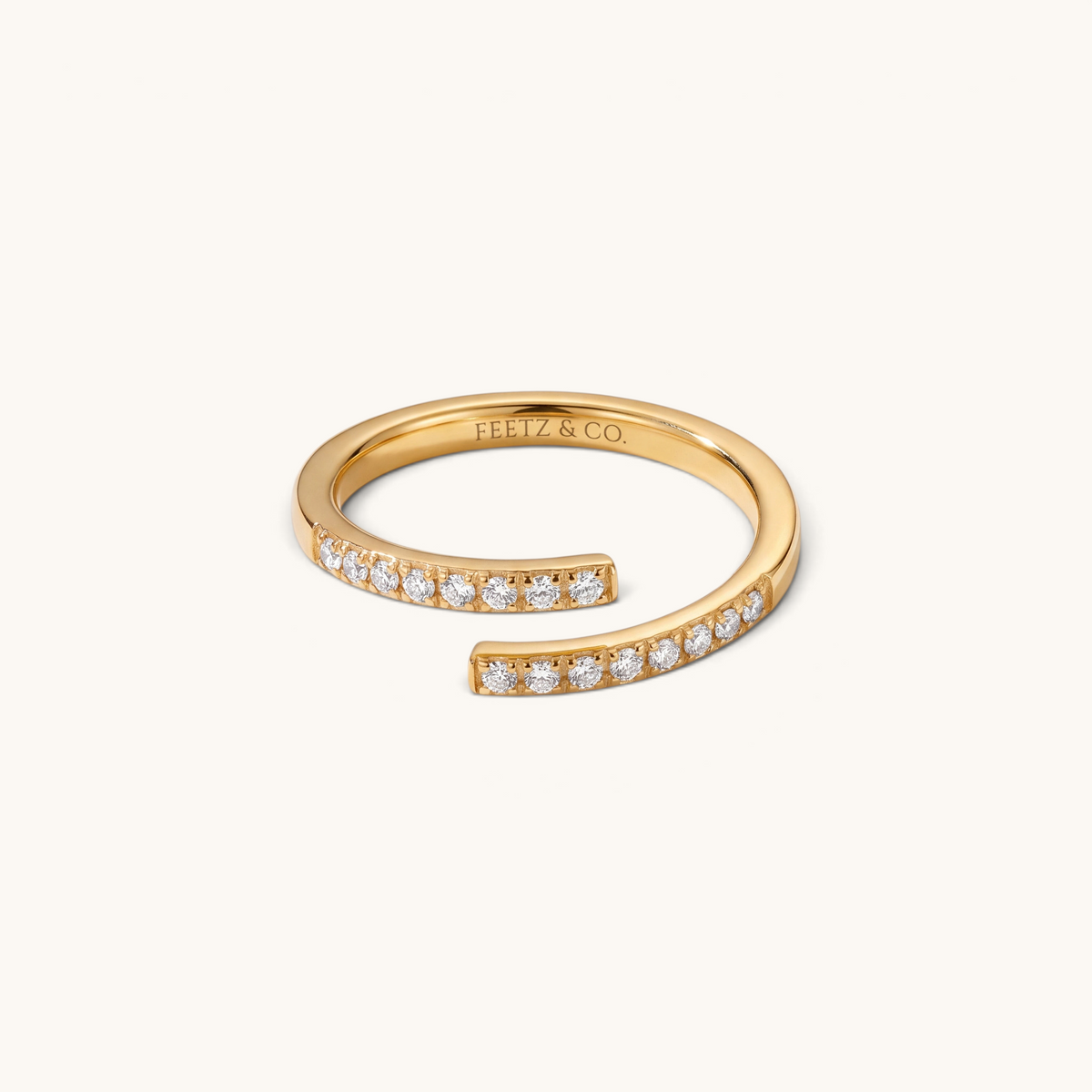 Feetz & Co. gold adjustable toe ring featuring two rows of sparkling stones in a polished stainless steel finish.