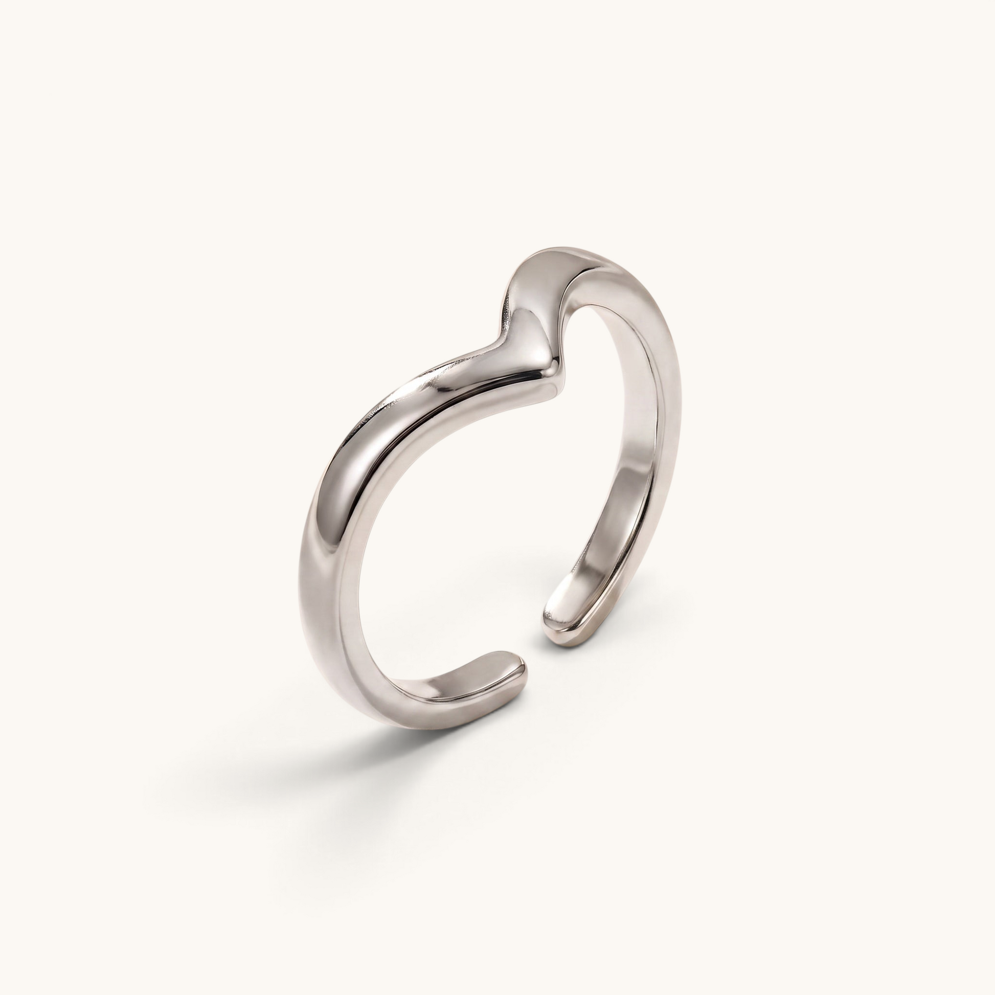 Feetz & Co. silver-plated stainless steel arrow toe ring with a minimal architectural V-peak design.