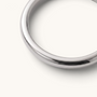 Feetz & Co. silver-plated stainless steel single toe ring with a smooth, polished, and minimalist open band design.