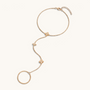 Feetz & Co. gold stainless steel barefoot sandal featuring delicate flower charms with clear stones and a toe loop.