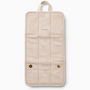 Feetz & Co. beige suede-feel jewelry travel folder with gold snap buttons and embossed logo, shown open.