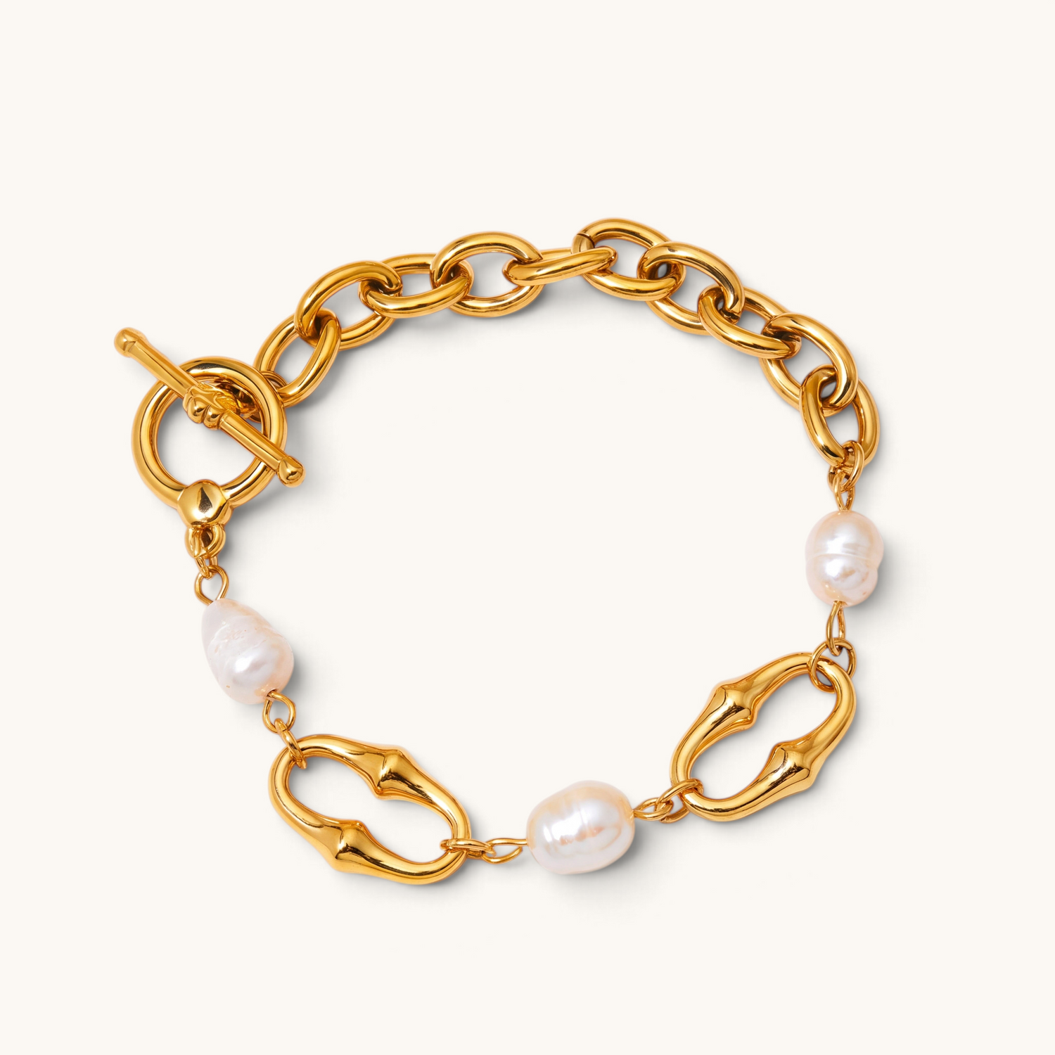 Feetz & Co. Perla anklet featuring gold-tone oval chain links and natural baroque freshwater pearls with toggle clasp.