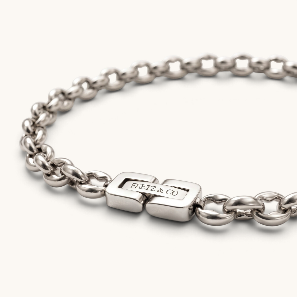 Feetz & Co. Remi Anklet featuring a silver-plated stainless steel rounded rolo chain with a branded clasp.