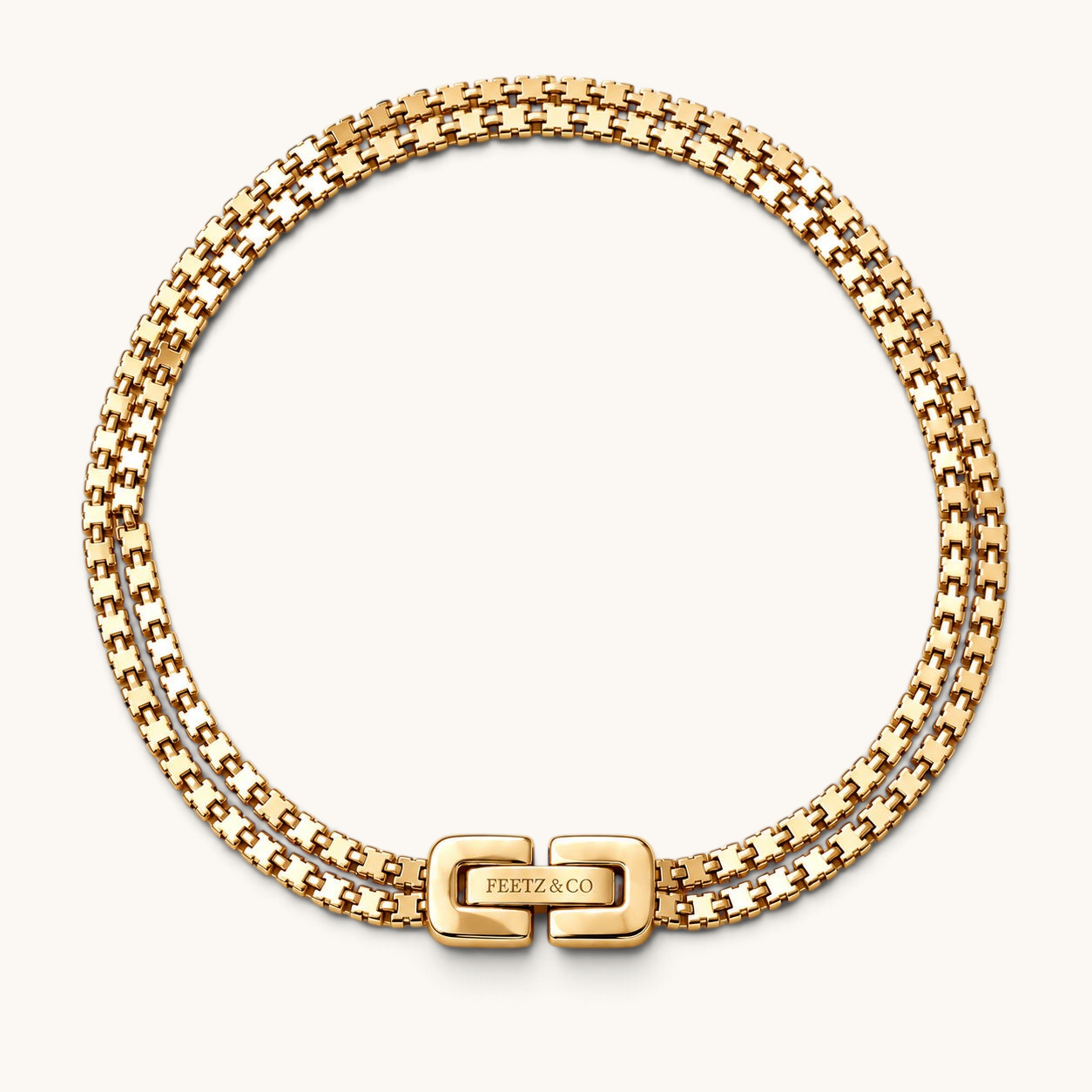 Feetz & Co. Rhea anklet featuring two rows of polished 18K gold-plated stainless steel box links with a secure clasp.