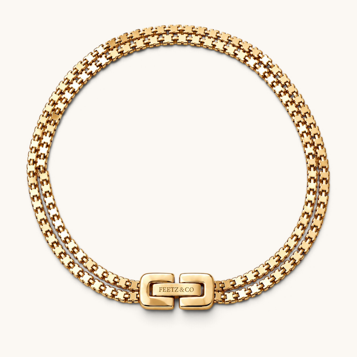 Feetz & Co. Rhea anklet featuring two rows of polished 18K gold-plated stainless steel box links with a secure clasp.