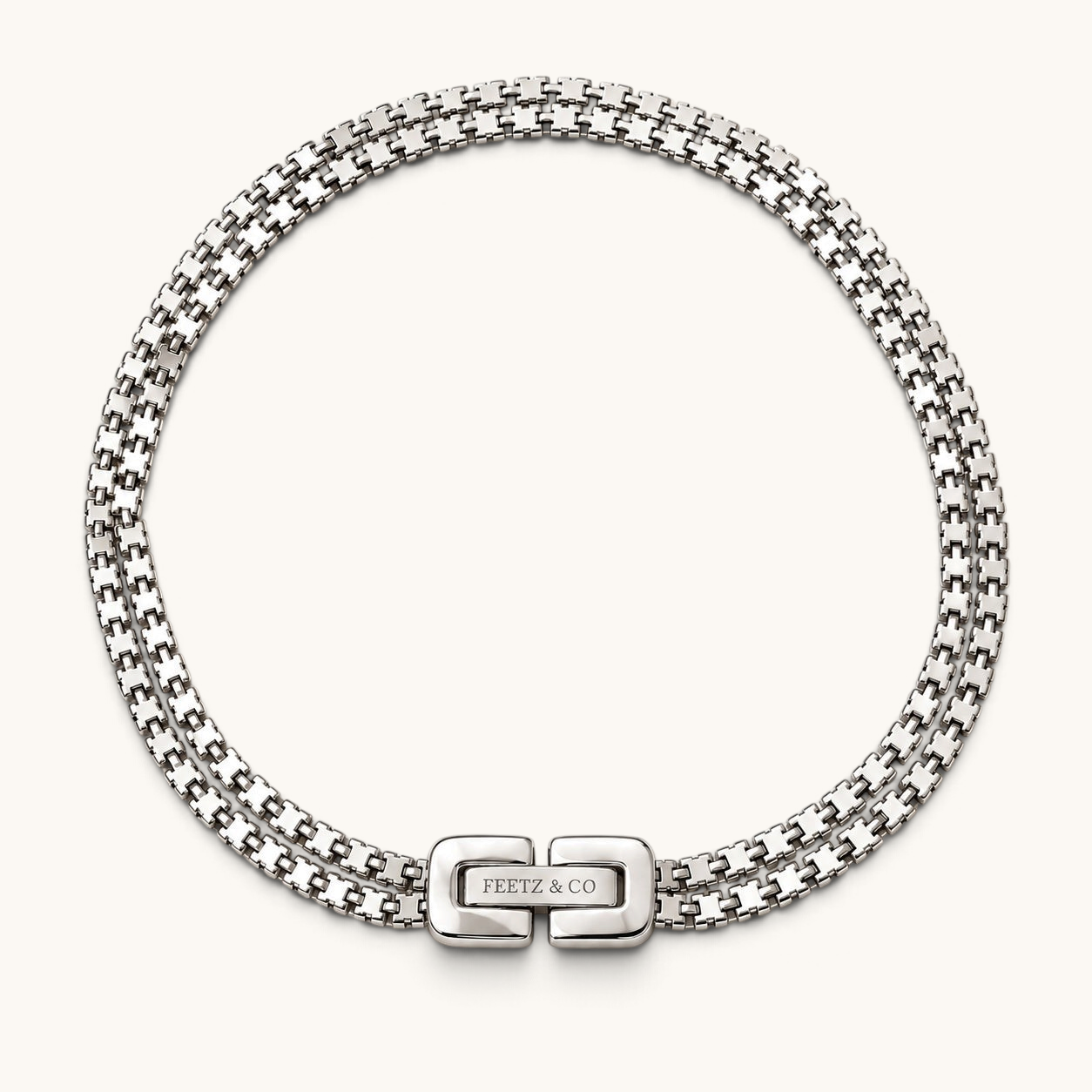 Feetz & Co. Rhea anklet featuring two parallel rows of silver-plated stainless steel box links with a branded clasp.