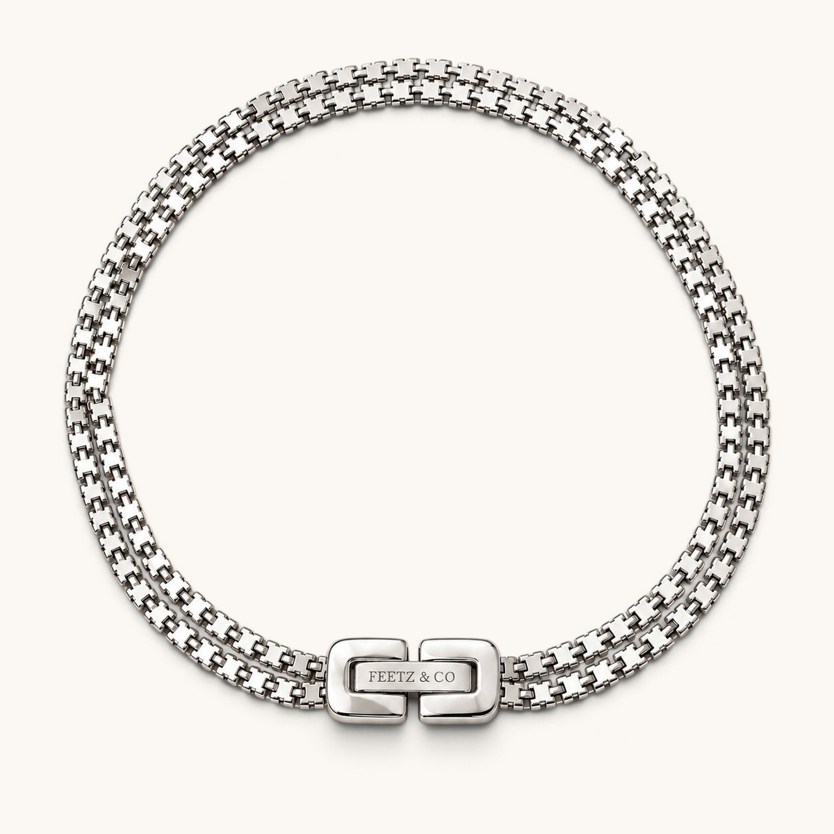 Feetz & Co. Rhea anklet featuring two parallel rows of silver-plated stainless steel box links with a branded clasp.