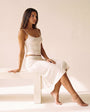 Rome Anklet Gold — Shot B (side-profile seated)