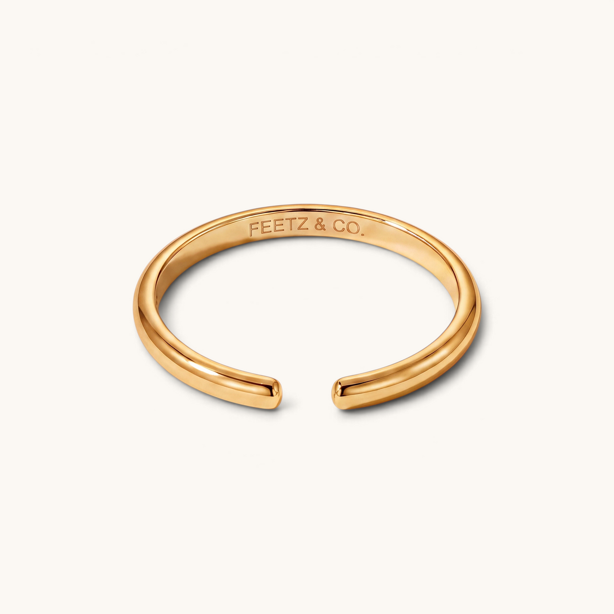 Feetz & Co. gold-plated stainless steel open band big toe ring with a smooth, polished minimalist design.