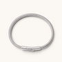 Feetz & Co. Viper anklet in polished silver stainless steel with a ribbed, flexible tube design and secure clasp.